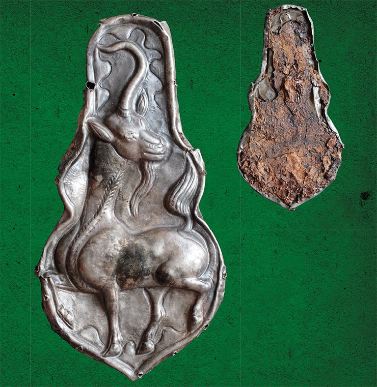 A silver plate (front and verso), a horse harness decoration from the Khunnu necropolis of Noin-Ula. Excavations by the Russian-Mongolian expedition, 2006 A silver plate (front and verso), a horse harness decoration from the Khunnu necropolis of Noin-Ula. Excavations by the Russian-Mongolian expedition, 2006