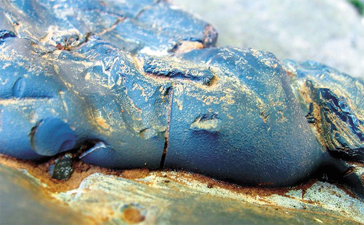The outermost layers of rapidly cooling magmatic melt retain its amorphous texture. The superficial layer of a solidified lava flow, so-called chill zone, is volcanic glass. The diversity of volcanic glass colors is determined by various metal admixtures