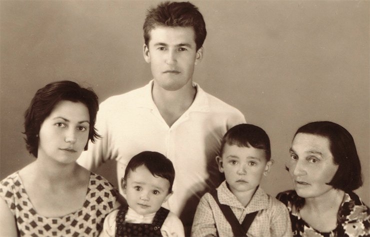 Six-month-old Andrei with his parents, brother and grandmother Six-month-old Andrei with his parents, brother and grandmother