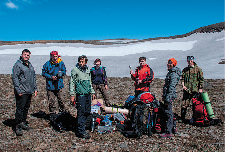 The team of Novosibirsk researchers has landed from the helicopter to the mountain pass where the camp is about to be installed