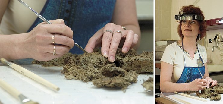 M. V. Moroz, a fine art restorer with the Museum Studies Department of the Institute of Archaeology and Ethnography SB RAS, is engaged in near work: she is removing clay particles from fragments of the cloth M. V. Moroz, a fine art restorer with the Museum Studies Department of the Institute of Archaeology and Ethnography SB RAS, is engaged in near work: she is removing clay particles from fragments of the cloth