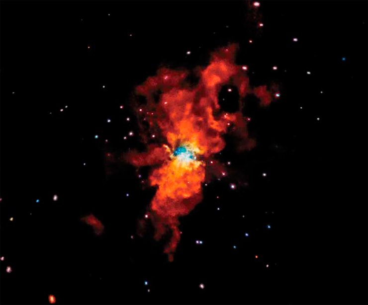 Supernova 2014J, which burst at a distance of about 11 million light years from our Galaxy, is the nearest star whose light from explosion reached the Earth in the last decade. The photo is assembled from images of the star’s neighborhoods, which were taken by the Chandra X-ray orbital telescope on the 13th day after detecting the explosion. Soft, medium, and hard X-ray radiation are shown in red, green, and blue, respectively. Credit: NASA/CXC/SAO/R. Margutti et al. Supernova 2014J, which burst at a distance of about 11 million light years from our Galaxy, is the nearest star whose light from explosion reached the Earth in the last decade. The photo is assembled from images of the star’s neighborhoods, which were taken by the Chandra X-ray orbital telescope on the 13th day after detecting the explosion. Soft, medium, and hard X-ray radiation are shown in red, green, and blue, respectively. Credit: NASA/CXC/SAO/R. Margutti et al.