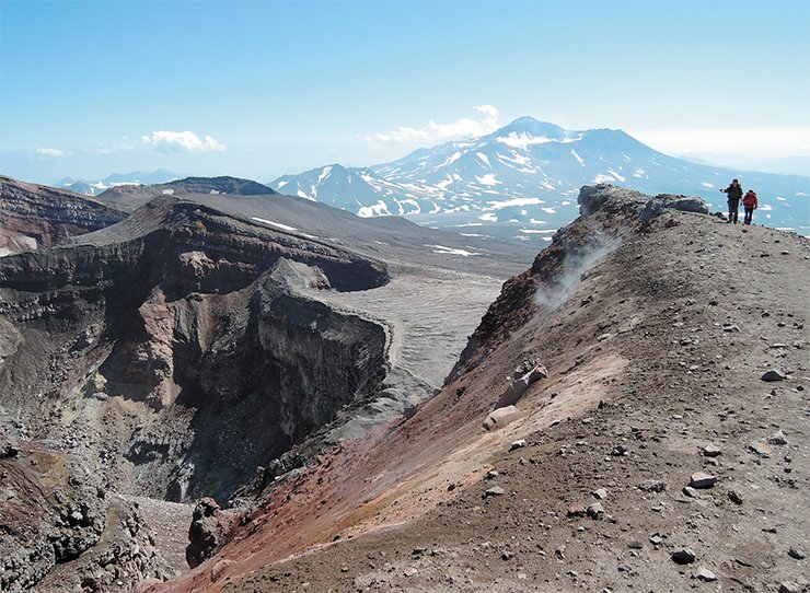The Gorelyi Volcano is 75 km southwest of Petropavlovsk-Kamchatskii. Gorelyi is a typical caldera volcano. Its present-day edifice is crowned by three fused large volcanic cones with dozens of side ruptures on their slopes. Atop the volcano there are eleven craters including the central crater, which ejects a powerful flow of gases