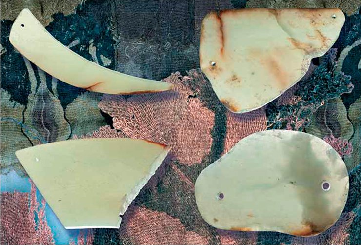 Most of the jade articles from Tumulus 22, Noin-Ula are well polished (on both sides) plates with several holes for stitching, which served as ornaments for clothes. Since antiquity, jade, which was called “the dragon’s semen,” was China’s most valuable stone. Han emperors were dressed in clothes made of jade plates before their burial. Perhaps, the unfinished jade pieces found in the tumulus were used to close the “nine holes” in the body of the deceased, which, according to the Han tradition, was supposed to preserve it for resurrection Most of the jade articles from Tumulus 22, Noin-Ula are well polished (on both sides) plates with several holes for stitching, which served as ornaments for clothes. Since antiquity, jade, which was called “the dragon’s semen,” was China’s most valuable stone. Han emperors were dressed in clothes made of jade plates before their burial. Perhaps, the unfinished jade pieces found in the tumulus were used to close the “nine holes” in the body of the deceased, which, according to the Han tradition, was supposed to preserve it for resurrection