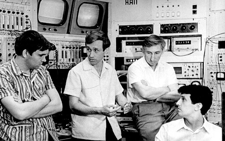 1978. Pioneers in science: Academician A. N. Skrinsky in the panel control room of the antiproton accumulator discusses the newly found phenomenon of super-rapid electron cooling with young researchers V. V. Parkhomchuk, I. N. Meshkov, and N. S. Dikanskii 1978. Pioneers in science: Academician A. N. Skrinsky in the panel control room of the antiproton accumulator discusses the newly found phenomenon of super-rapid electron cooling with young researchers V. V. Parkhomchuk, I. N. Meshkov, and N. S. Dikanskii