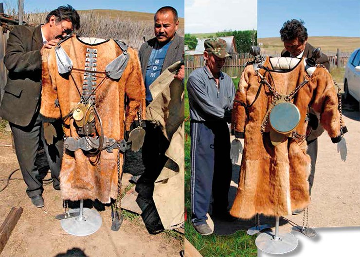 The ritual clothes, made of roe-deer skin, have a metallic model of a human skeleton and protective mirrors fastened to them. The mirrors protect the shaman against evil spirits. The final adjustment of the shaman’s ritual clothes. The big mirror protects the heart and sternum. On the shoulders, there are figurines of eagles, which are considered to be messengers of gods The ritual clothes, made of roe-deer skin, have a metallic model of a human skeleton and protective mirrors fastened to them. The mirrors protect the shaman against evil spirits. The final adjustment of the shaman’s ritual clothes. The big mirror protects the heart and sternum. On the shoulders, there are figurines of eagles, which are considered to be messengers of gods