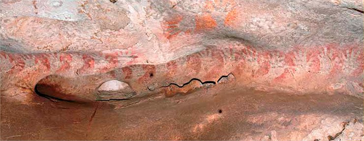 Negative hand prints on the ceiling of the Ham cave (Borneo). Photo Luc-Henri Fage © Le Kalimanthrope