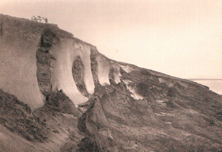 Ice in the soil on the oceanic shore near the River Bolshaya. Photo by I. Tolmachoff. From: (Tolmachoff, 1911) Ice in the soil on the oceanic shore near the River Bolshaya. Photo by I. Tolmachoff. From: (Tolmachoff, 1911)