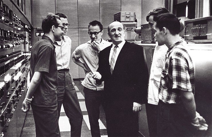 In the VEPP-2 control room. From left to right: V. A. Sidorov, I. Ya. Protopopov, S. G. Popov, G. I. Budker, A. N. Skrinsky, and V. V. Petrov. 1964. Photo by R. Akhmerov In the VEPP-2 control room. From left to right: V. A. Sidorov, I. Ya. Protopopov, S. G. Popov, G. I. Budker, A. N. Skrinsky, and V. V. Petrov. 1964. Photo by R. Akhmerov