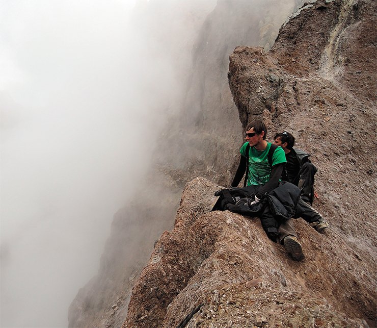 Explorers at the edge of the active crater of Mutnovsky