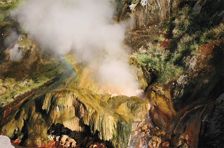 The Malachite Grot is the most beautiful geyser in the Valley: in the evening in certain hours a rainbow flares over it. Virtually everybody wants to have his picture taken next to this natural wonder. The Geyser Valley, Kamchatka The Malachite Grot is the most beautiful geyser in the Valley: in the evening in certain hours a rainbow flares over it. Virtually everybody wants to have his picture taken next to this natural wonder. The Geyser Valley, Kamchatka