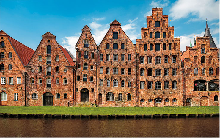 Former salt warehouses on the Trave River, built in the 16th–18th cc. © CC BY-SA 3.0/Jorge Franganillo
