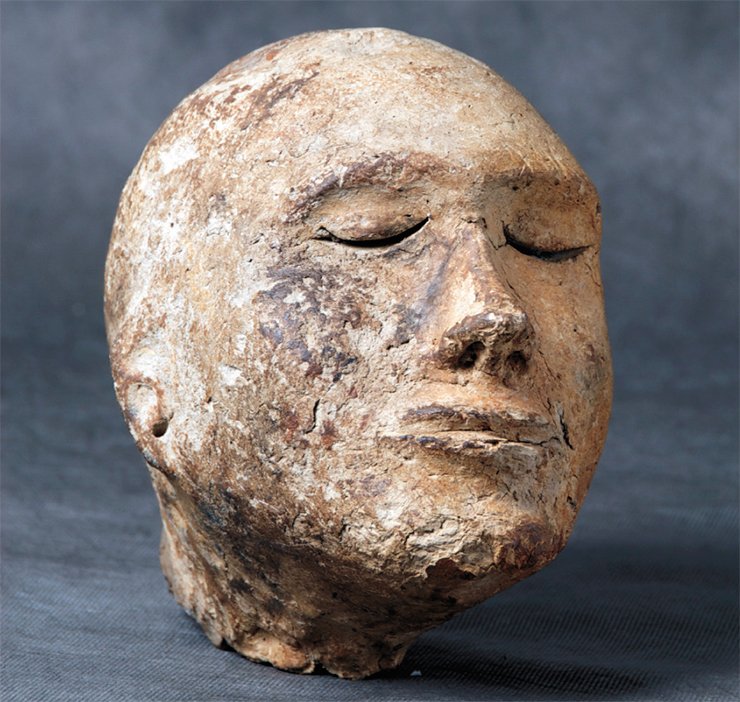 Clay head from the Shestakov tomb. The Kemerovo Oblast. Excavated by A. I. Matrynov. Photo by M. Vlasenko Clay head from the Shestakov tomb. The Kemerovo Oblast. Excavated by A. I. Matrynov. Photo by M. Vlasenko