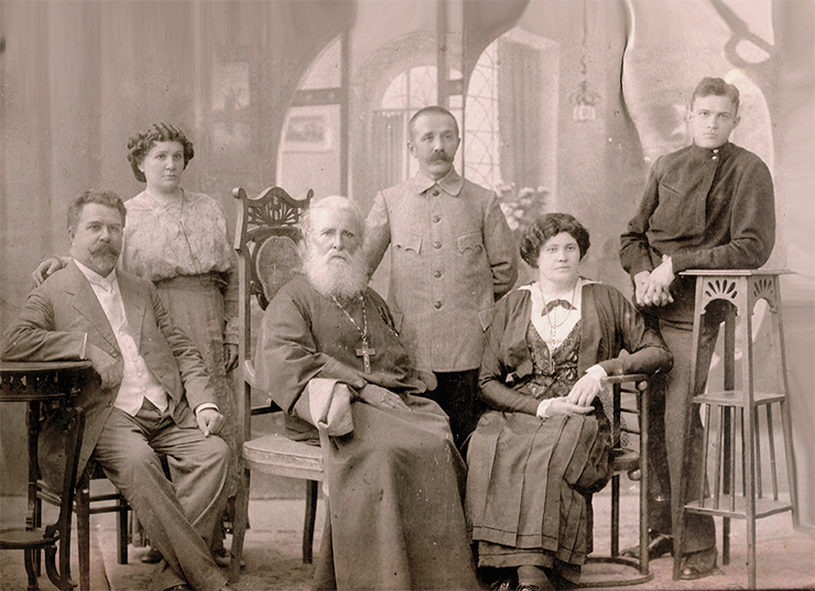 The Pokrovsky family shortly before the revolution. In the center is the great-grandfather Fr. Feodor. From left to right are his children Ilya Feodorovich (Pokrovsky’s grandfather), Maria Feodorovna, Vasily Feodorovich, Anna Ivanovna (grandmother), and Nikolai Ilyich (father). Rostov-on-Don, 1917 The Pokrovsky family shortly before the revolution. In the center is the great-grandfather Fr. Feodor. From left to right are his children Ilya Feodorovich (Pokrovsky’s grandfather), Maria Feodorovna, Vasily Feodorovich, Anna Ivanovna (grandmother), and Nikolai Ilyich (father). Rostov-on-Don, 1917