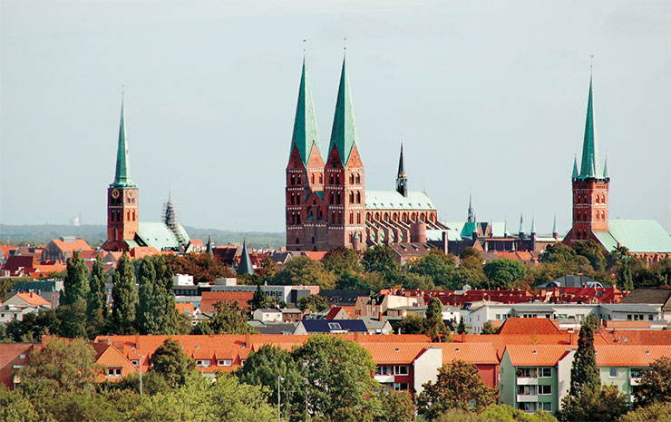 The city of Lübeck – the center of the Hanseatic League – was founded in the mid-12th century; in 1226, Emperor Frederick II granted it the status of a free imperial city. Above: Panorama of the old part of modern Lübeck. © CC-BY-SA 3.0/Oleg Dejan