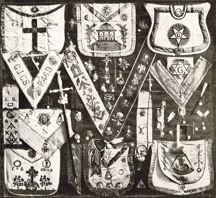 The exhibition of 1912 with objects from D. G. Burylin’s Masonic collection at the Exhibition “1812” in the hall “Moscow 1812”: clasps (aprons) and sashes for different Masonic charters comprising part of Masonic dress; Masonic bags and Masonic symbols of different charters The exhibition of 1912 with objects from D. G. Burylin’s Masonic collection at the Exhibition “1812” in the hall “Moscow 1812”: clasps (aprons) and sashes for different Masonic charters comprising part of Masonic dress; Masonic bags and Masonic symbols of different charters